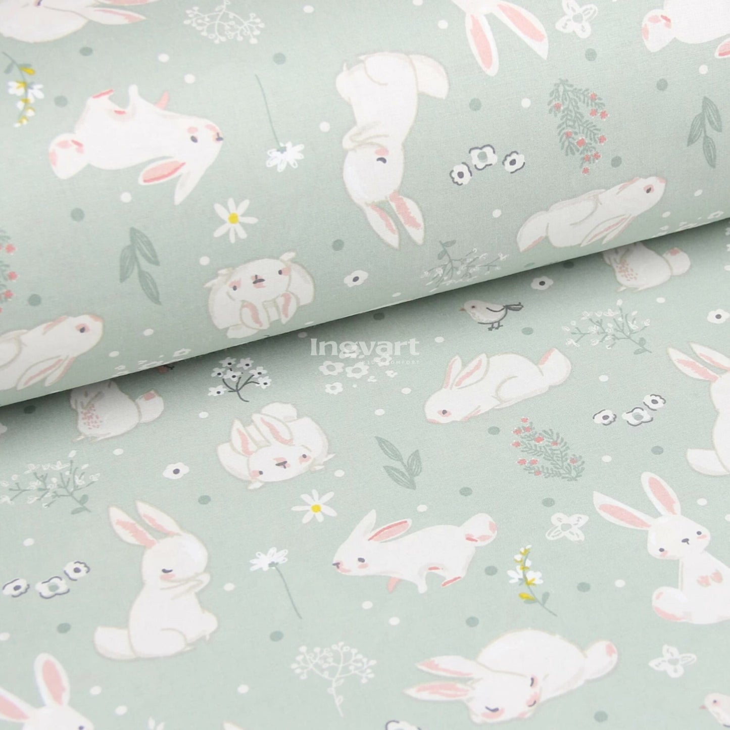 Baumwolllaken mit Hasenmotiv auf mintgrünem Hintergrund